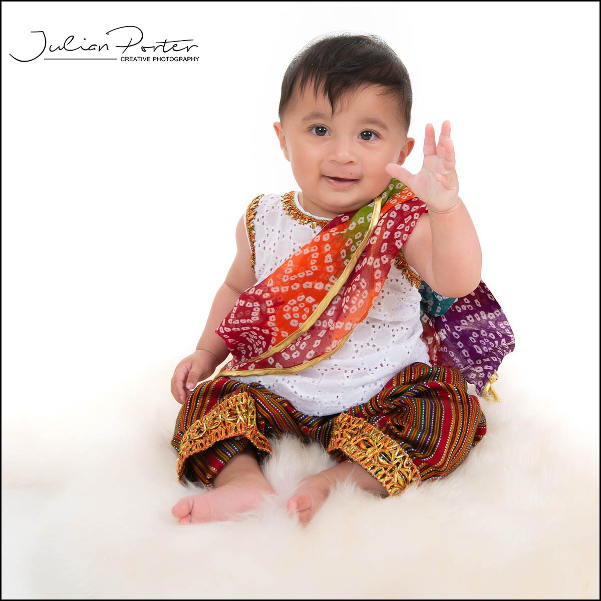 baby in traditional Pakistan dress