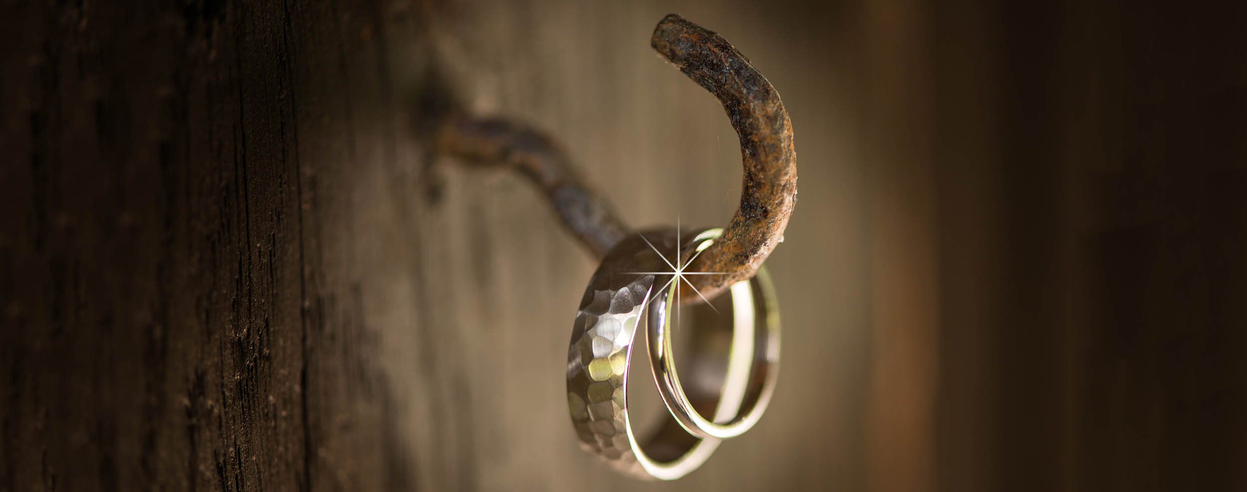 Wedding rings hanging on a hook